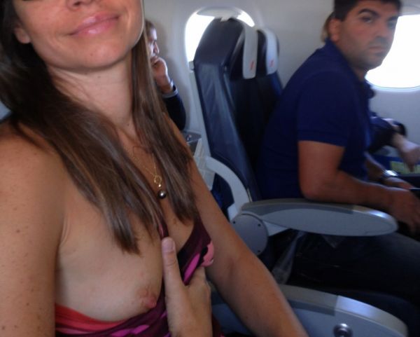 babes flashing on airplane