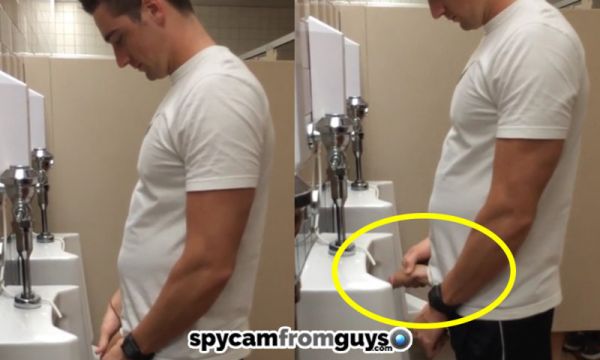 male using urinal