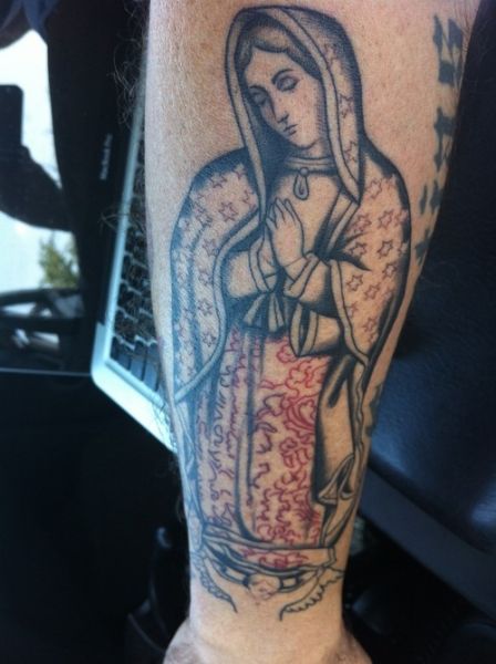 virgin mary hand tattoo