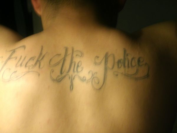 tattoo fuck the police arrested
