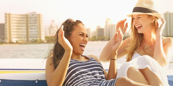 group women laughing mocking