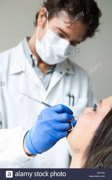 pretty female dentist gloves