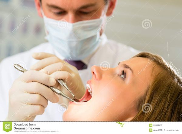 cute female dentists wearing gloves