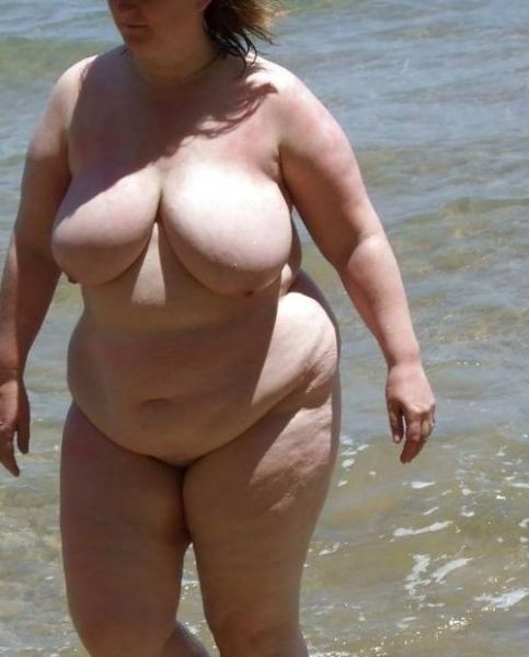 young chubby girl on beach