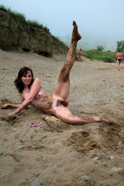 women shirtless on the beach