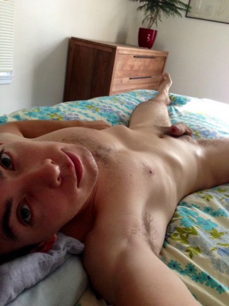 men naked in bed face down