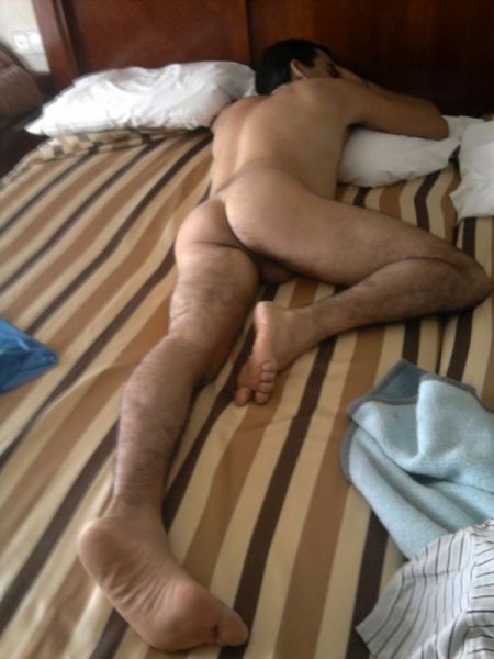 horny guy naked in bed
