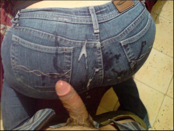 women in tight pants bent over