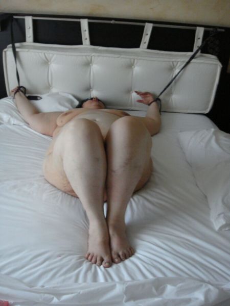men tied to bed strapon