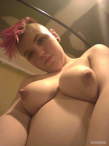 busty topless beach selfie