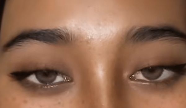girl with clock eye