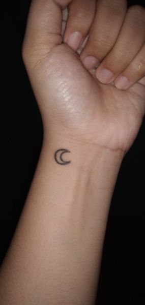 moon thigh tattoo