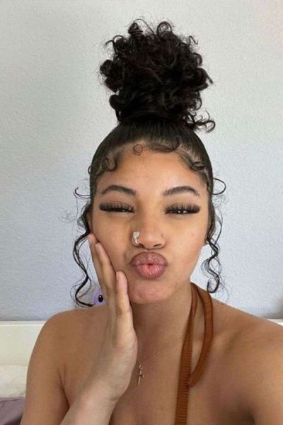 brown girl with a bun