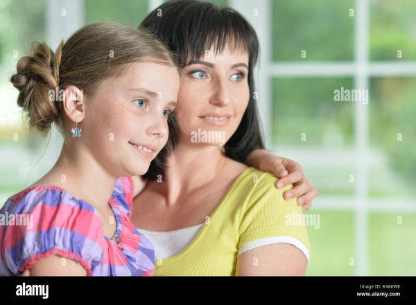 mother daughter hugging smiling