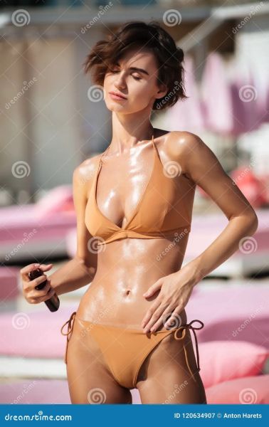 oiled up swimsuit