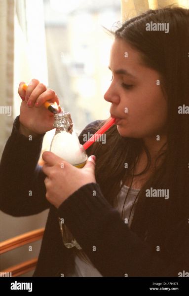 black women holding crack in hand