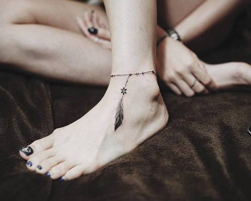 tribal foot tattoos