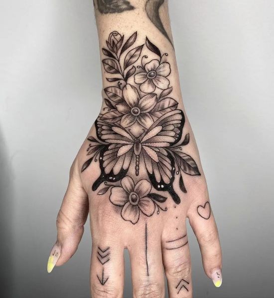 feather tattoo on hand