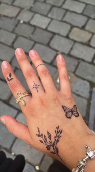 feminine hand tattoos