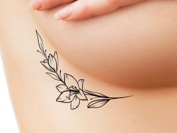 woman full chest tattoo