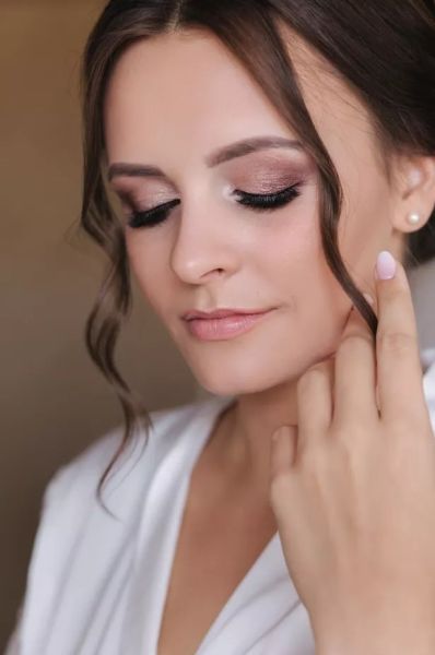 bride with skincare products