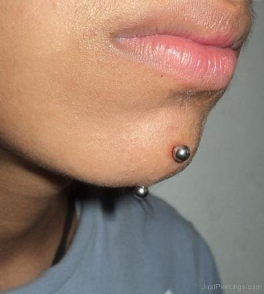 above lip piercing
