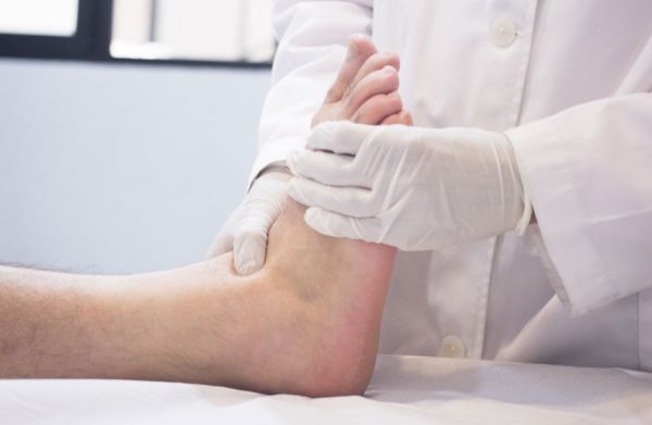 pain and swelling on top of foot