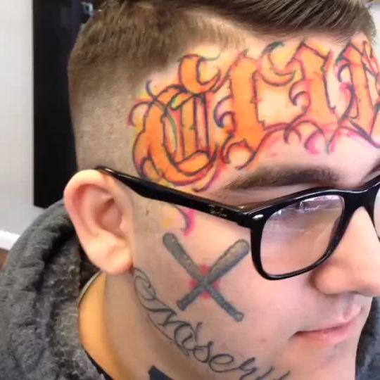 blackout face tattoo