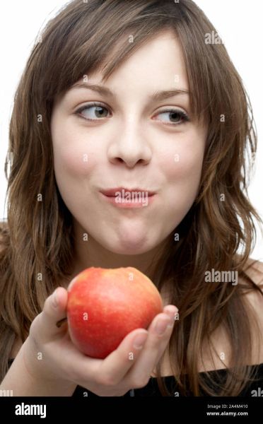 she is eating a apple