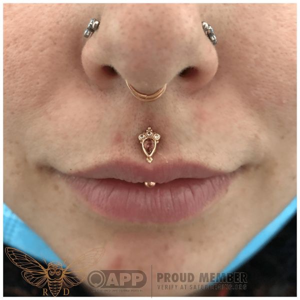 bottom lip piercing
