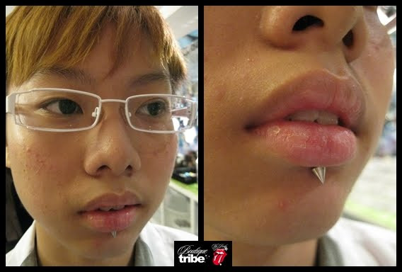 cheek piercing