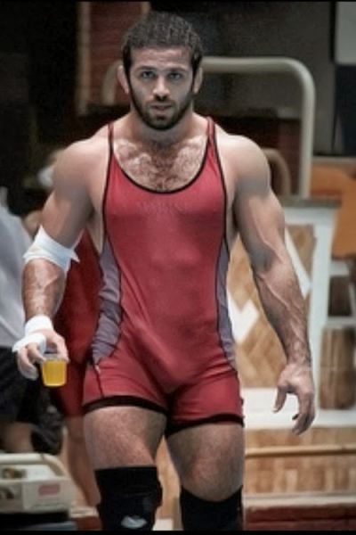 men in wrestling uniforms