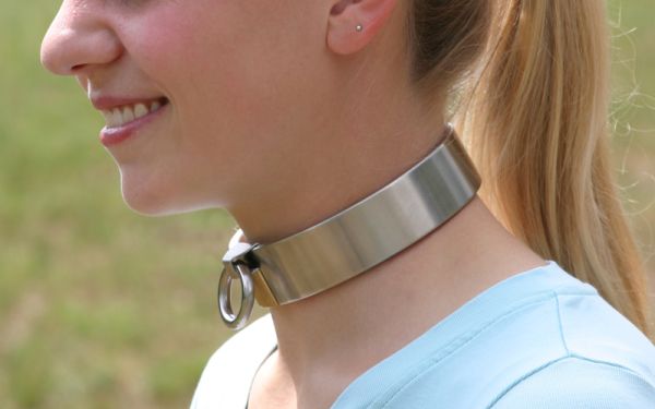 girls wear weld on metal cuffs and collars
