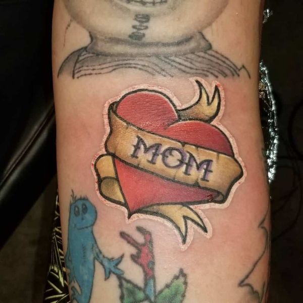 heart and scroll tattoo