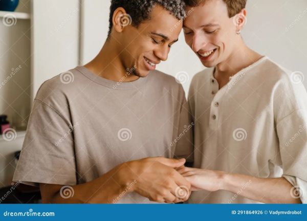 four hands holding each other