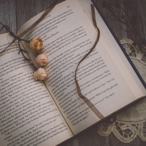professional formal photo poses for women with book