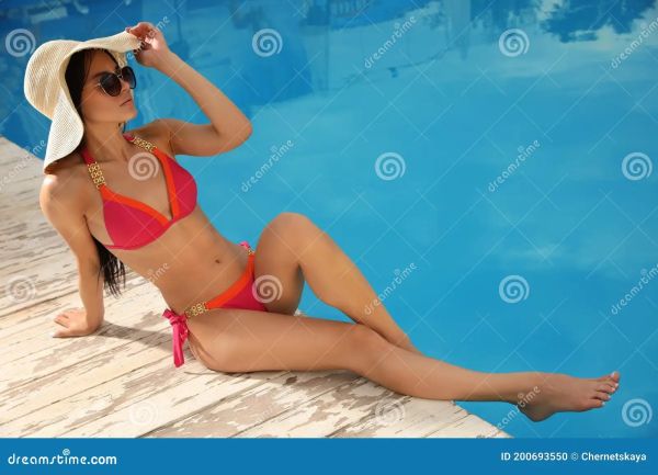 bikini sitting pool