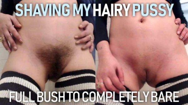 fingering her shaved pussy