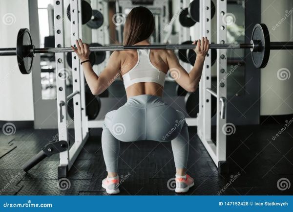 skinny heels squatting babe
