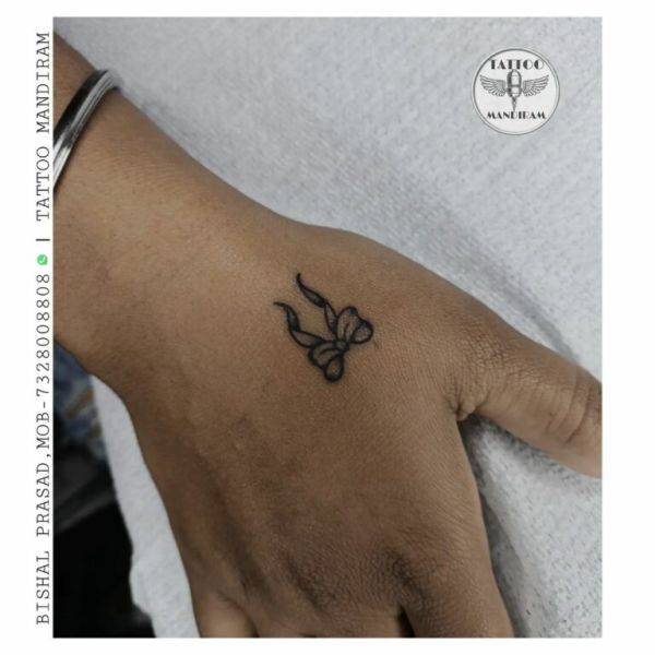 elegant finger tattoos