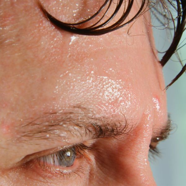 sweating women face