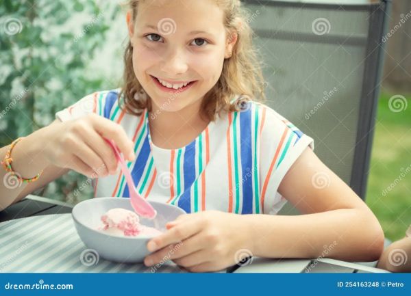 girl eating egg