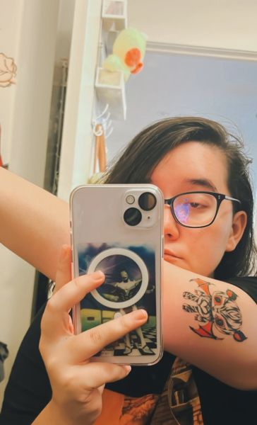 korean girl covering face with phone