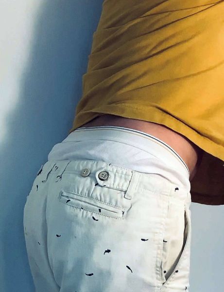 hand on front of white briefs