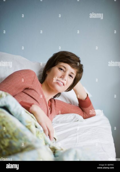woman laying on the side lines