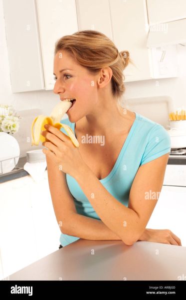 woman eating banana picture