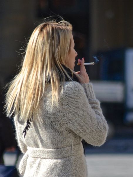 woman smoking cigar
